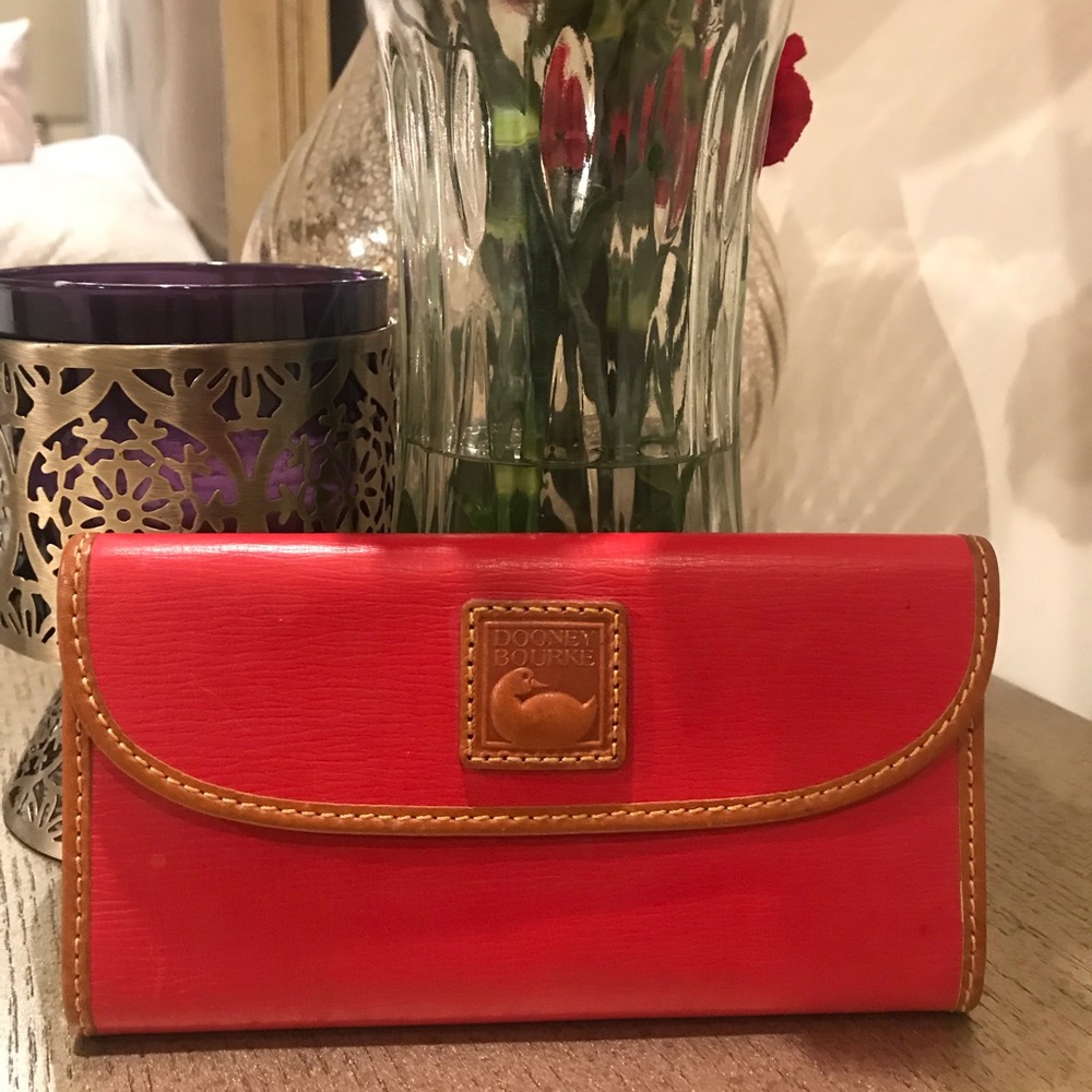 Dooney & Bourke trifold red wallet.